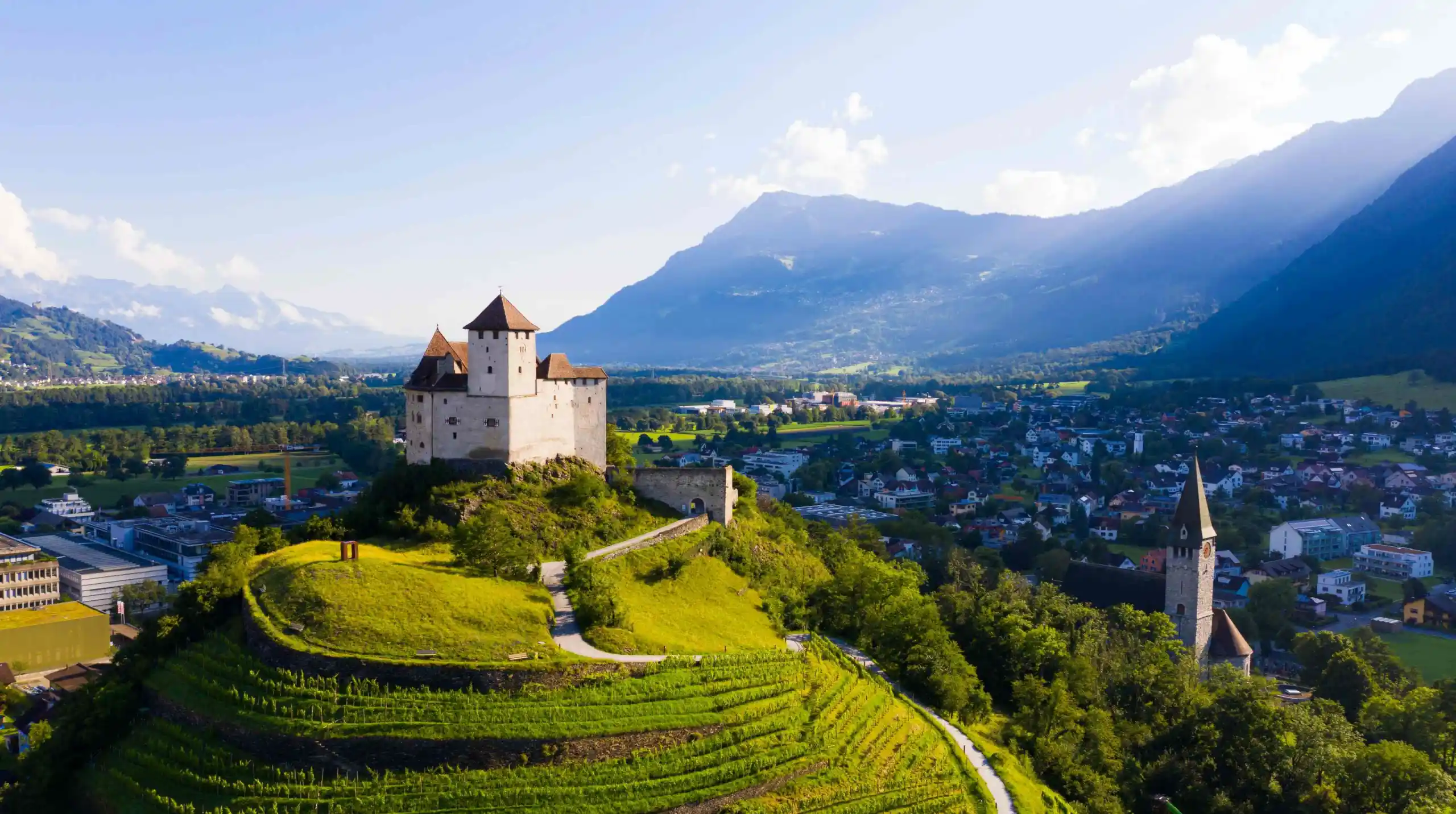 **Liechtenstein**
Liechtenstein, tucked between Switzerland and Austria, offers stunning alpine landscapes and picturesque villages. Explore Vaduz’s modern and historic architecture or hike the 75 km trail to enjoy breathtaking mountain views.