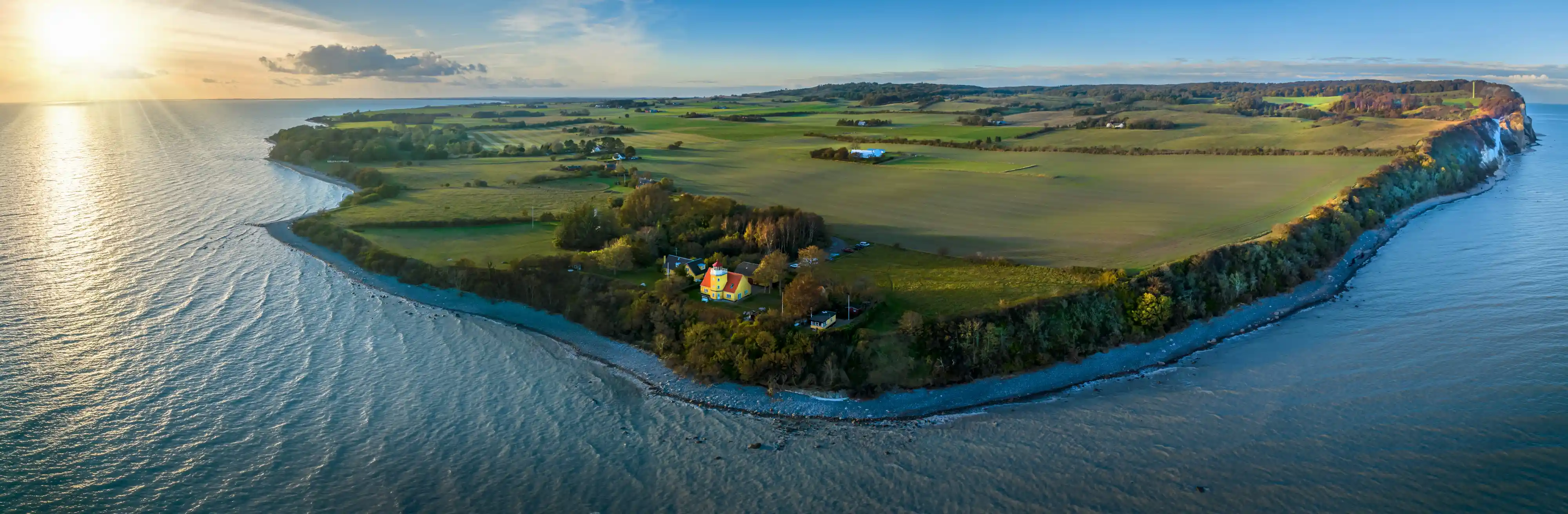 **Denmark**
Denmark is known for its cozy “hygge” lifestyle, charming towns and scenic coastline. Copenhagen is home to the Little Mermaid and Tivoli Gardens while the rural areas offer castles, coastal villages and bike trails.